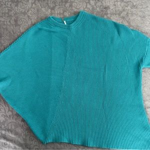 Free People Ribbed Knit Asymmetrical Sweater. No stains or tears.Size M